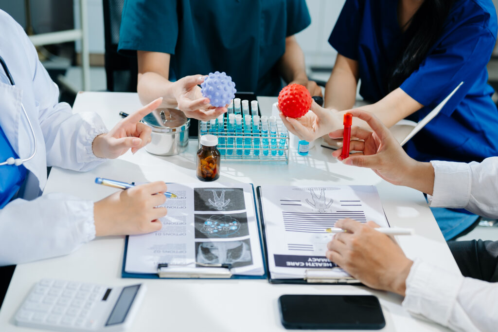 Orthopedic specialists in Houston discussing regenerative cartilage treatment at Dr. Burke Orthopedics